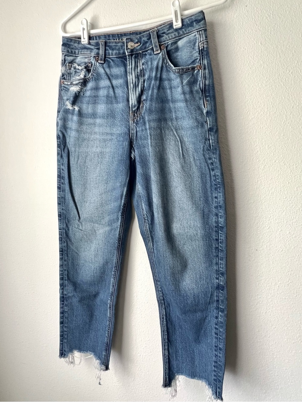 American Eagle Outfitters medium wash High Rise Mom Jeans with Raw Hem